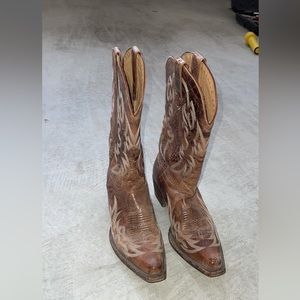 Barely worn cowboy boots. Not quite broken in yet but still very comfortable